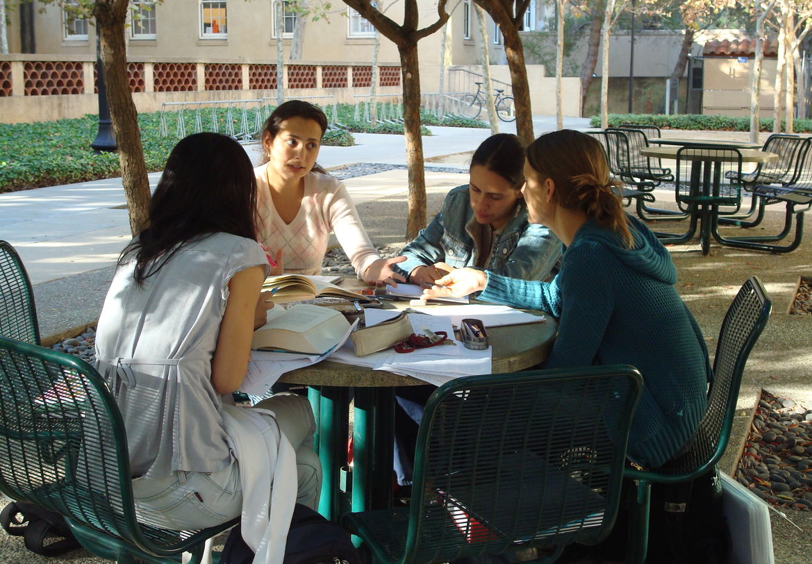 Students sitting around table